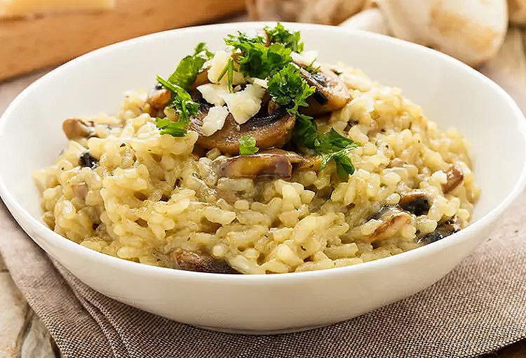 Foto de Risotto au poulet et aux champignons boletus