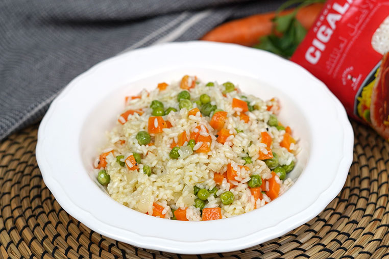 Foto de Riz aux carottes et petits pois